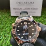 Omega Seamaster black rubber strap 300m Stainless Steel Sedna Gold Co Axial Master Chronometer Black Dial 42mm