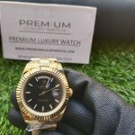 Rolex Day Date 40 Yellow Gold Black Diagonal Motif Index Dial & Fluted Bezel President Bracelet 228238