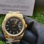 Rolex Day Date 40 Yellow Gold Black Diagonal Motif Index Dial & Fluted Bezel President Bracelet 228238