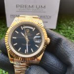 ROLEX DAY DATE GOLD BLACK Dial 40MM PRESIDENTIAL Fluted Bezel Watch 228238