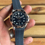 Omega Seamaster black rubber strap 300m Stainless Steel Sedna Gold Co Axial Master Chronometer Black Dial 42mm
