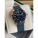 Omega Seamaster black rubber strap 300m Stainless Steel Sedna Gold Co Axial Master Chronometer Black Dial 42mm