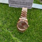 Rolex Day-Date 40 Everose Gold Sundust Watch