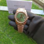 Rolex Day-Date Rose Gold Green Dial 40MM President Fluted Bezel Watch