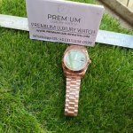 Rolex Day-Date Rose Gold Green Dial 40MM President Fluted Bezel Watch