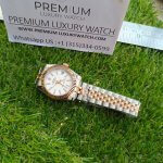 Rolex Oyster Perpetual Two Tone Datejust 41MM White Dial Watch