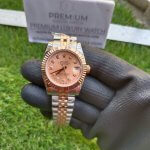 Rolex Oyster Perpetual Datejust 31MM Ladies Oyster Perpetual Datejust Two Tone Orange Dial Diamond Jubilee Bracelet Watch