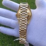 Rolex Day Date ii Stainless Steel Yellow Gold Champagne With Diamond Bezel And 41MM Roman Dial President Bracelet Watch