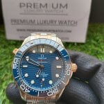 Omega Seamaster 300m on wrist | 42MM Blue Dial Rose Gold | Two Tone Bracelet Watch